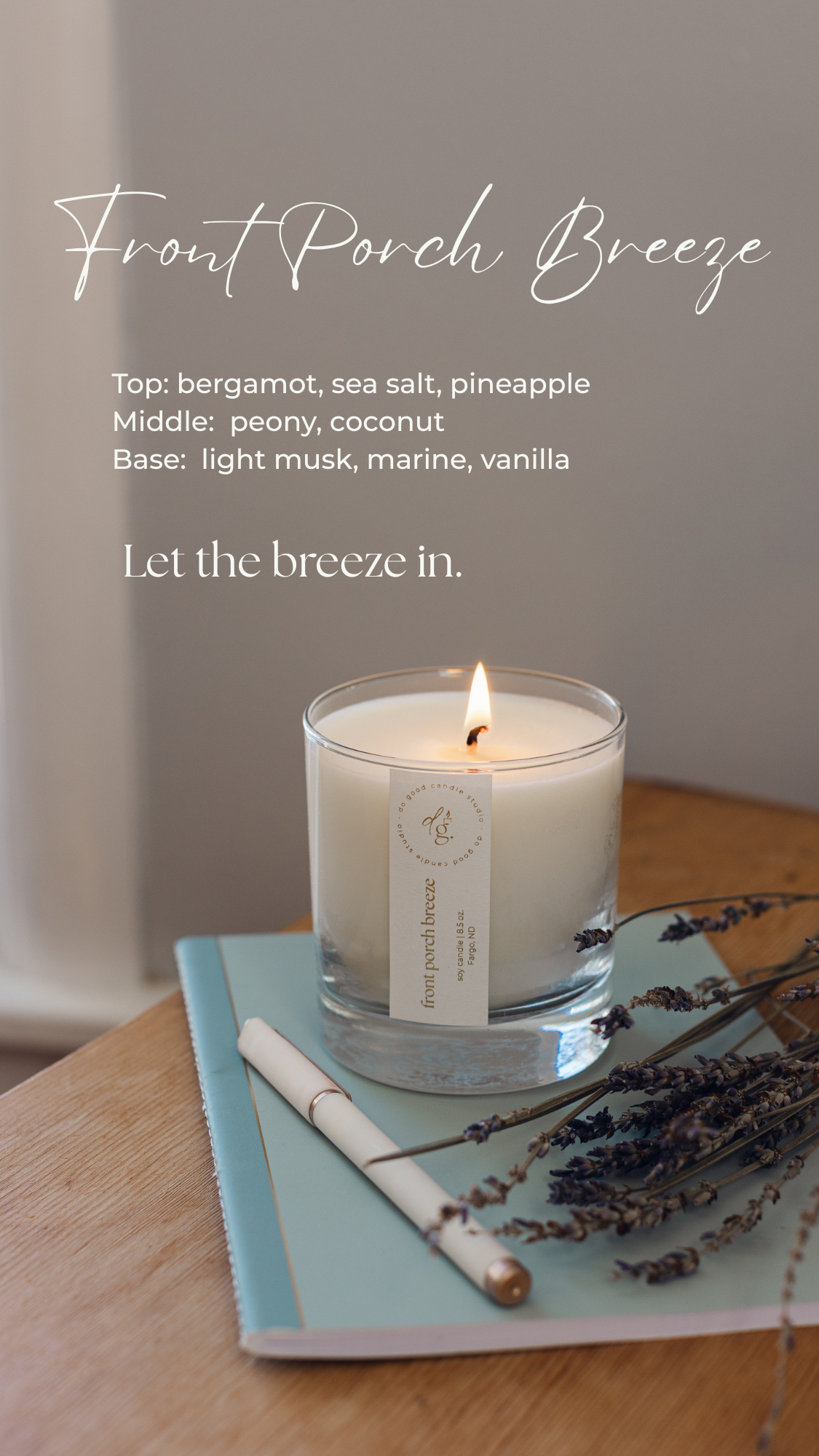 front porch breeze image with scent notes and "let the breeze in" text overlay.  candle is burning on a journal with a pen and lavender nearby
