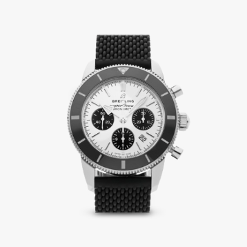 A Breitling Superocean Heritage B01 Chronograph watch on a gray tile.