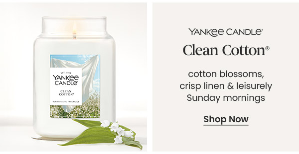 Yankee Candle jar with clean cotton label and lily of the valley flowers next to text describing scent with shop now button.