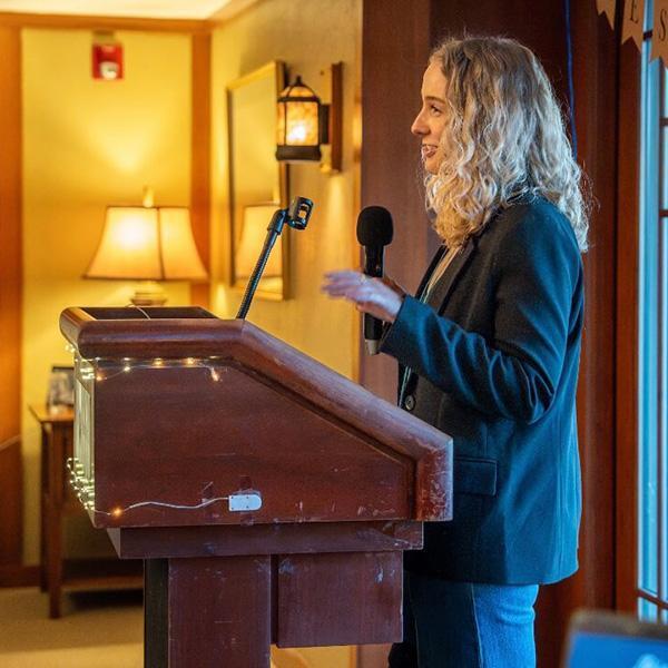 Riley McDevitt, giving a keynote speech for Camp Kesem.