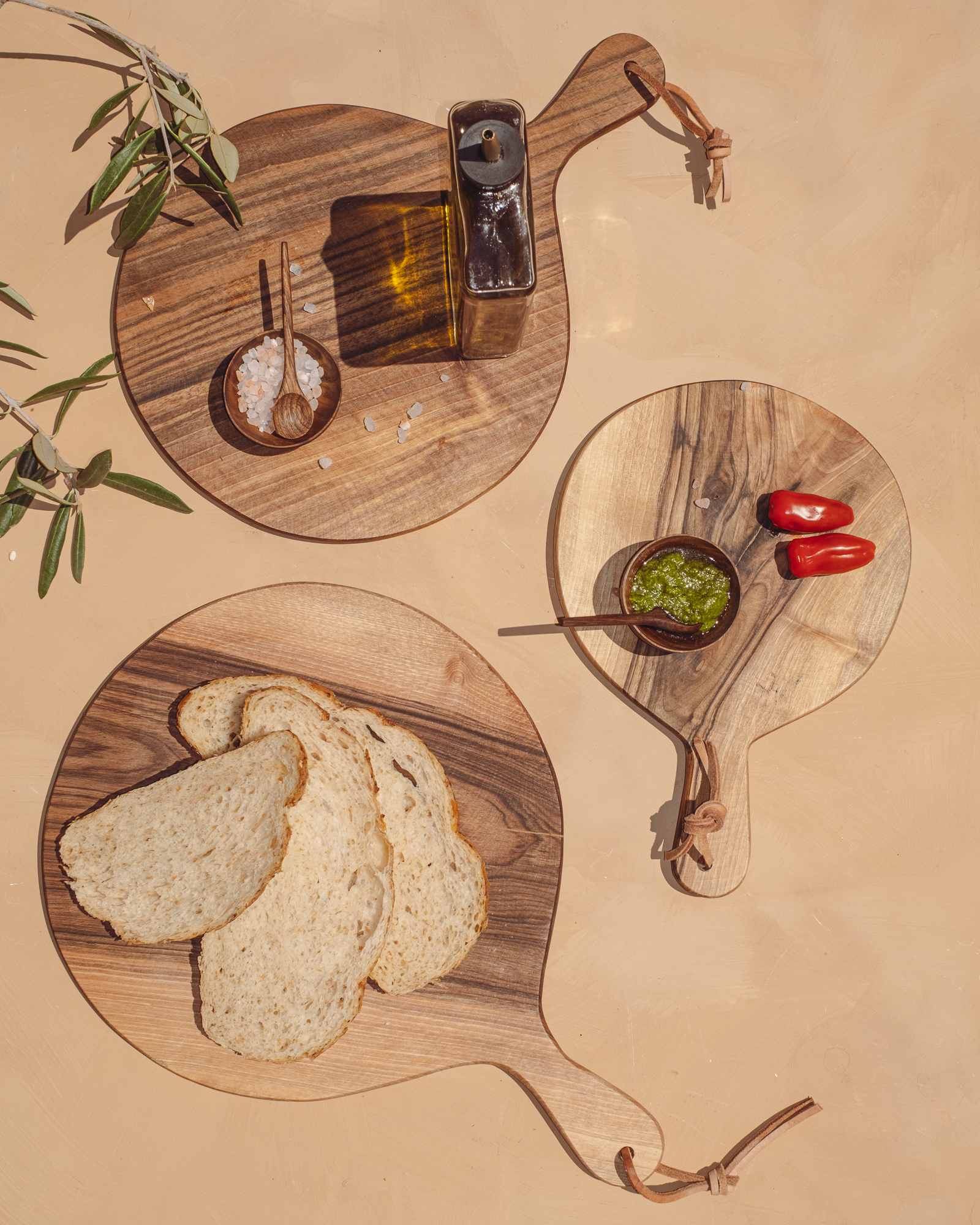 a brown wooden table with a water jar