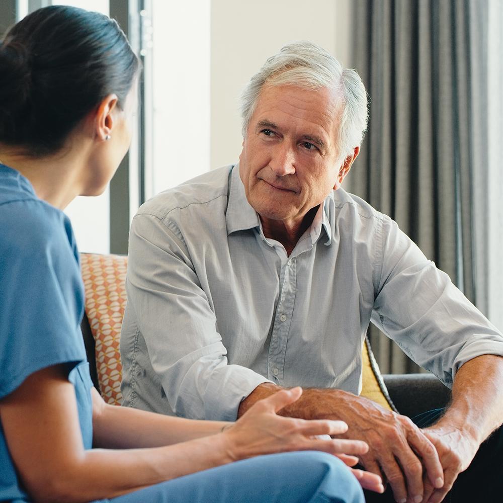 Doctor talking to a patient on medical appointment.
