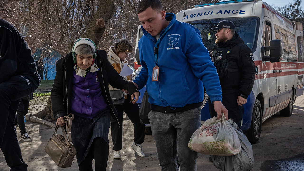 Zhelizniak Zoia, 61, arrives at an evacuation centre in Sumy from a village near the Russian border 