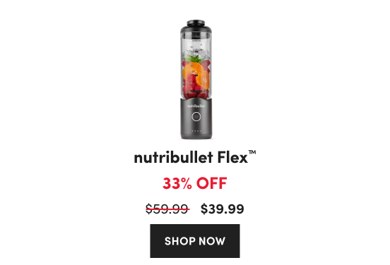 A grey nutribullet Flex™ portable blender containing raspberries, sliced oranges, mint, and ice cubes on a white background.