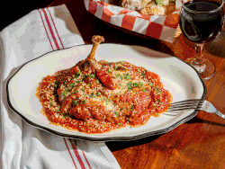 Rotating gif of chicken parm, peas and carrots, and table with fried whole dorade.