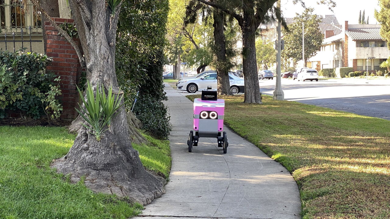 An autonomous delivery robot named Pinky delivers food in California.