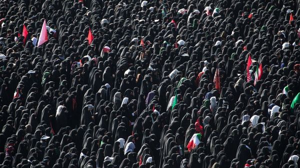 An aerial shot of Iranian mourners in Tehran.