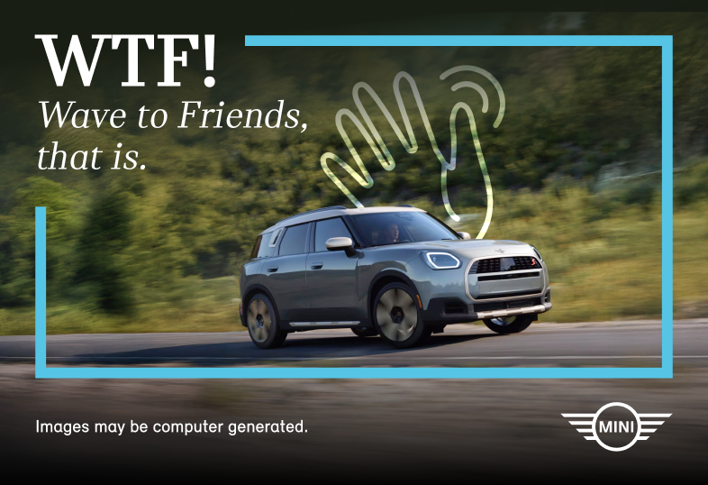 MINI driving on mountain road, hand icon waving.