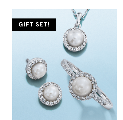 White gold diamond and pearl jewelry gift set with pendant necklace, matching stud earrings and ring.