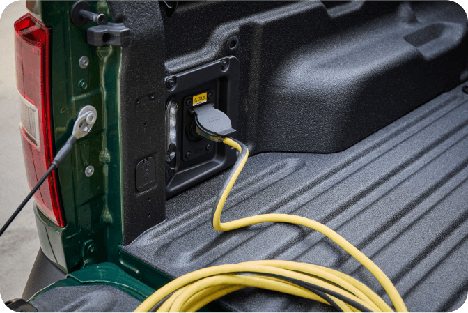 A close‑up view of a power outlet in the Ford Maverick&reg; truck&rsquo;s bed