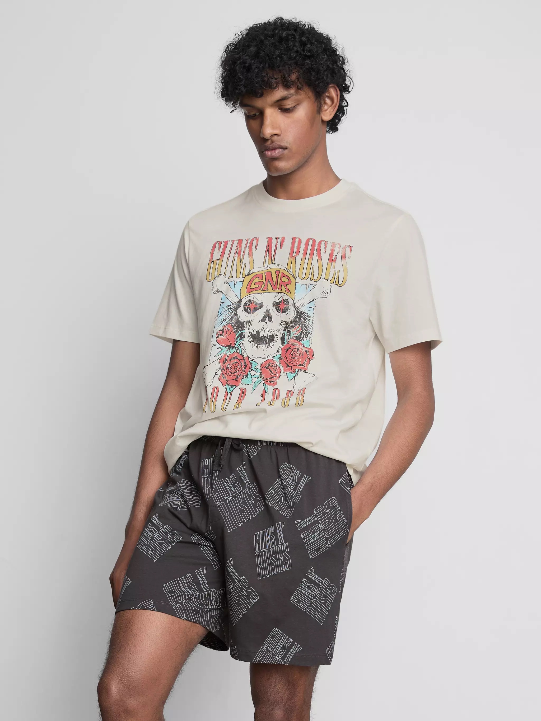 Man wearing a Guns N' Roses Short Pajama Set