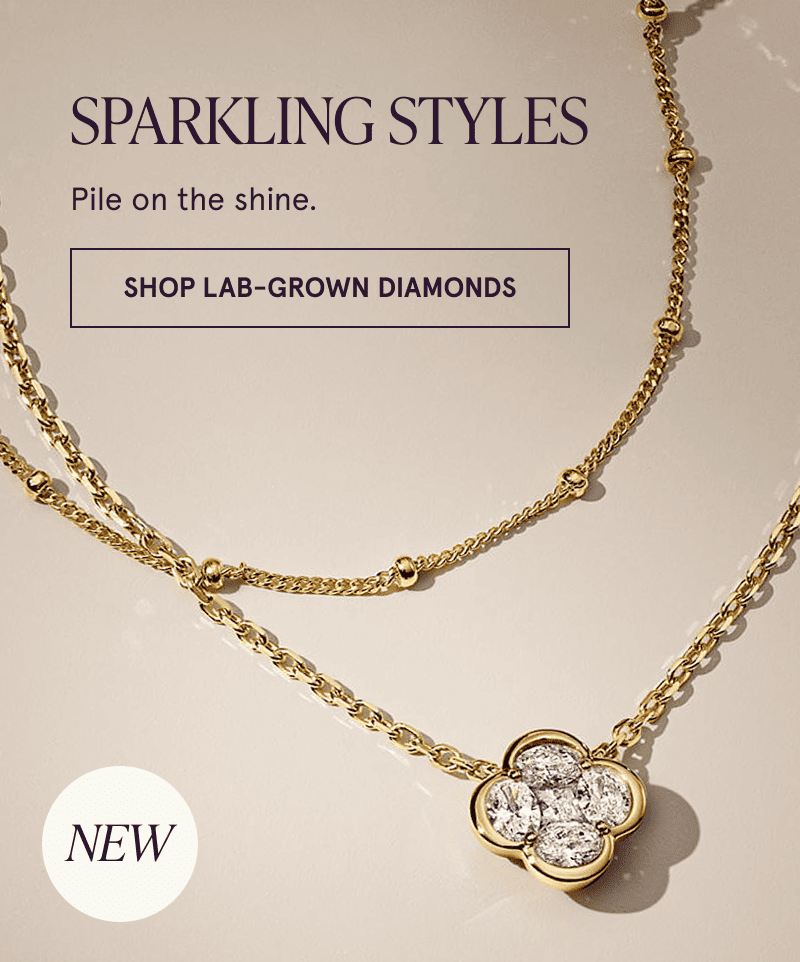 A gold station chain and a gold diamond chain with a floral pendant. Click here to shop lab-grown diamonds