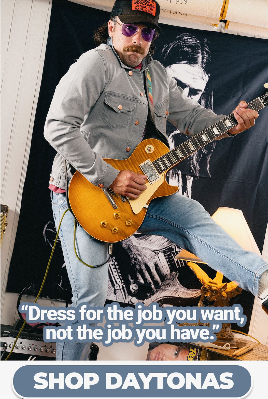Dress for the job you want not the job you have [IMG of man with guitar]