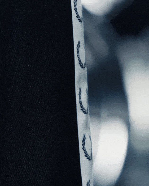GIF of the Fred Perry Taped Track Jacket
