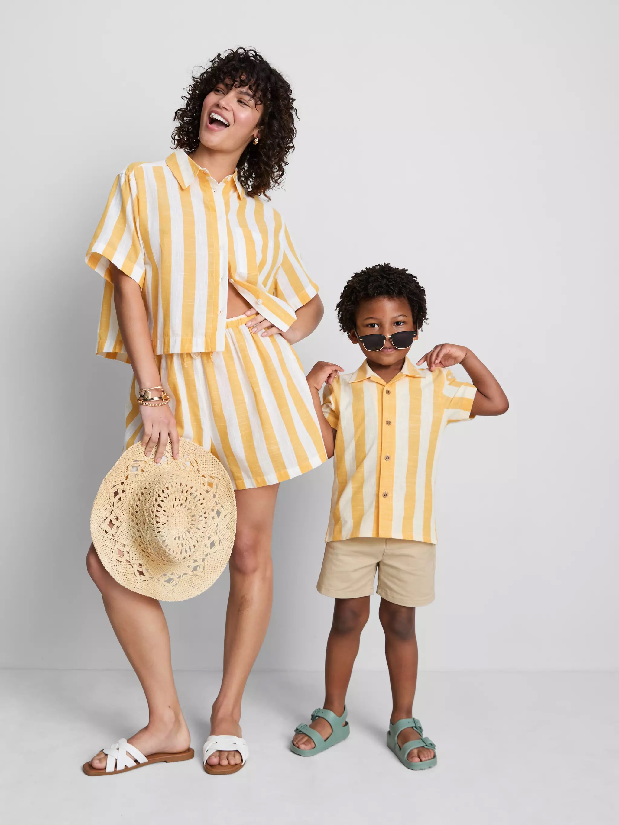 Woman and a boy wearing a  Stripe Shirt in yellow.