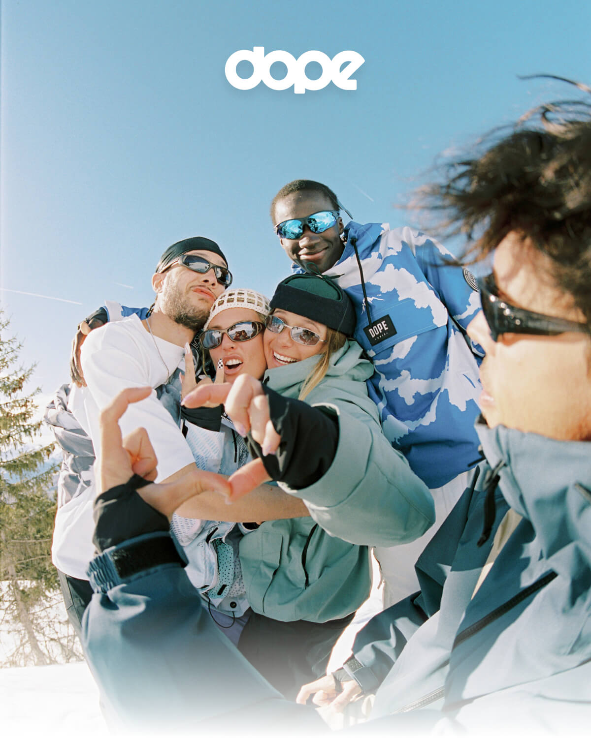 Dope. Snowboarders smiling while wearing ski goggles.