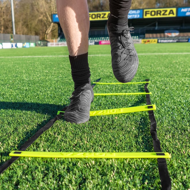 Soccer player training with the FORZA Speed & Agility Ladder.