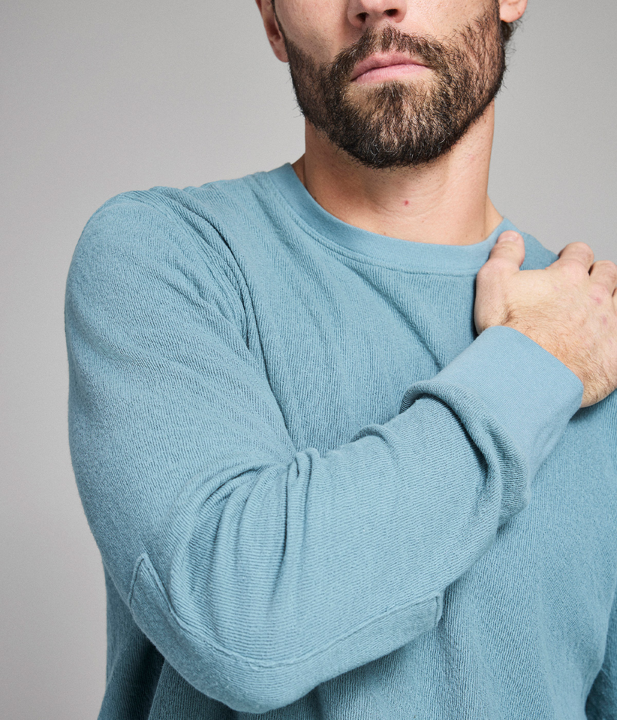 Model wears Billy Reid sweater.