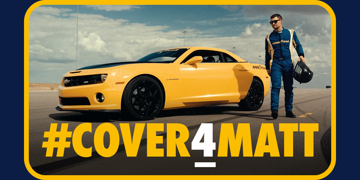 #Cover4Matt | Picture of Matt Evans on the test track standing next to a car