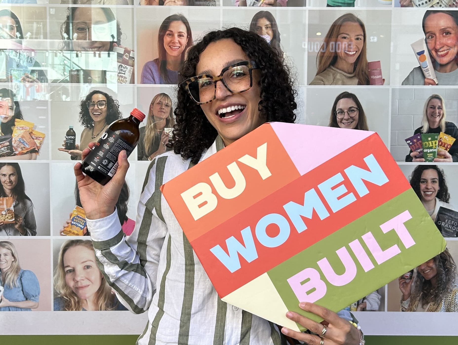 Lisa at the Buy Women Built event, with a bottle of MOMO.