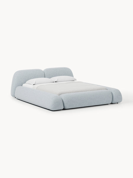 Letto imbottito in bouclé con contenitore Wolke