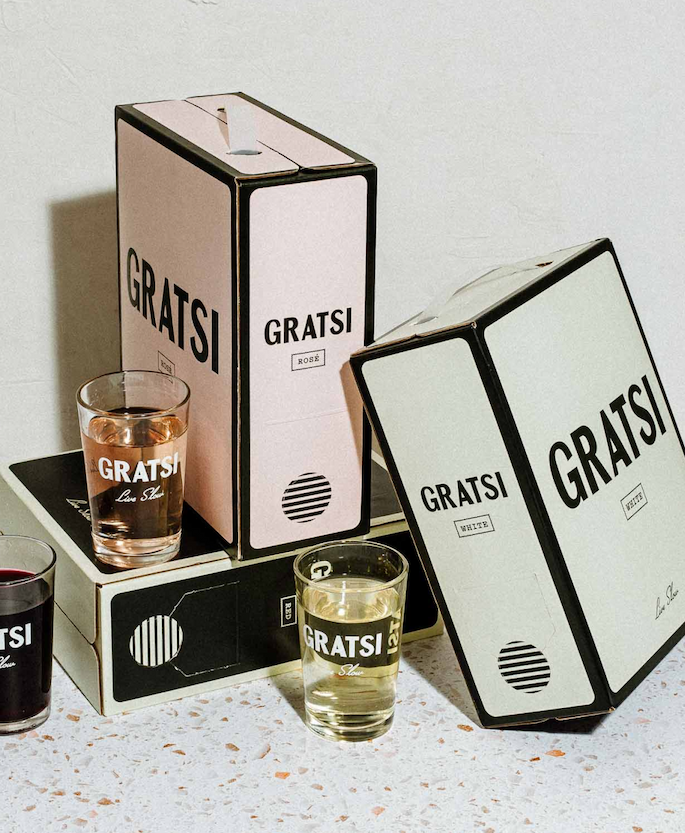 Variety Pack of Gratsi Red, White, and Rosé Boxed Wines stacked with bàcaro glasses.