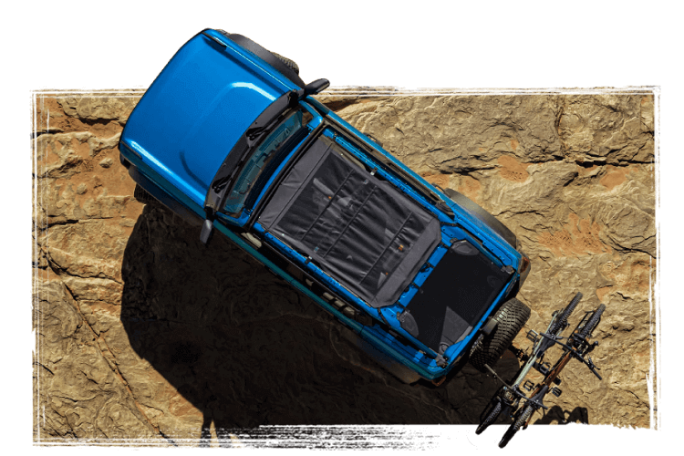 An overhead view of a Bronco&reg; SUV in a rocky landscape