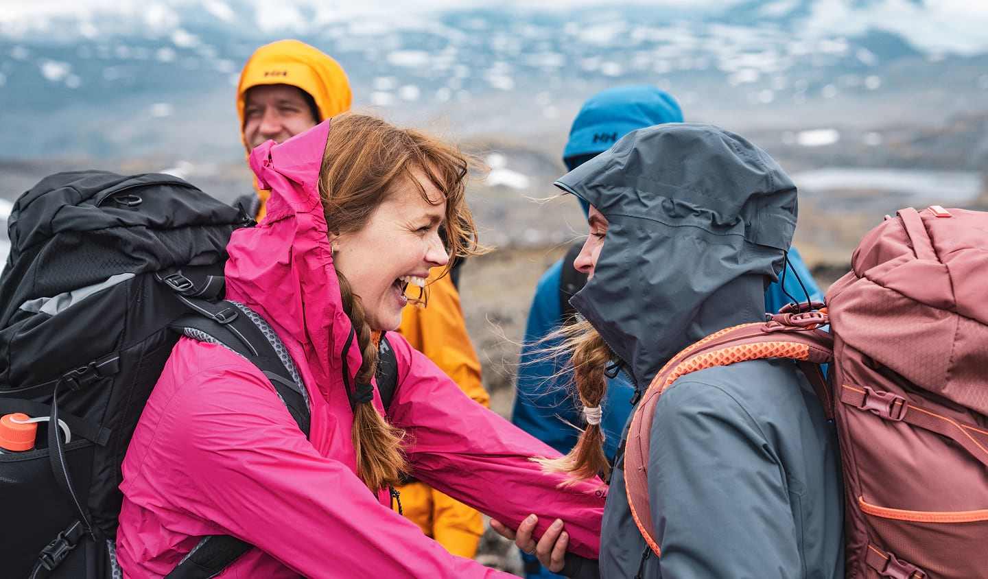 A group of hikers with Helly Hansen backpacks