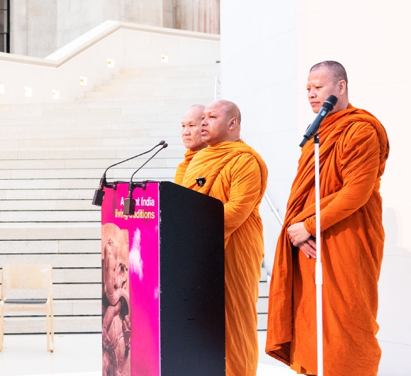 Monks from Buddhapadipa Temple in Wimbledon perform blessing chants at the exhibition opening event in the Great Court.
