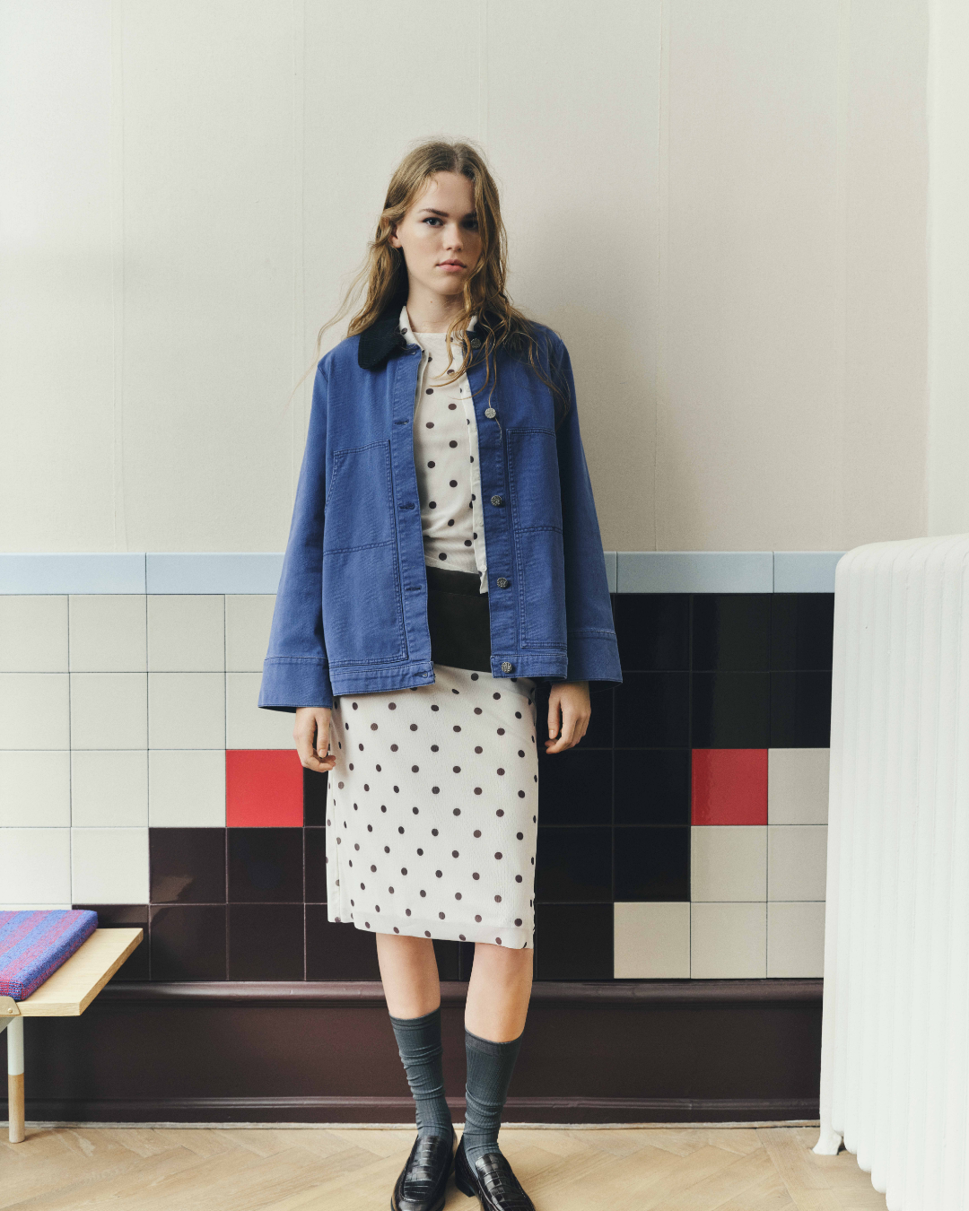 Girl in polka dots and blue denim jacket