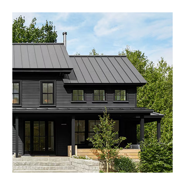Gray stone masonry leads up to a modern home with black siding and shed-style aluminum black roofing.