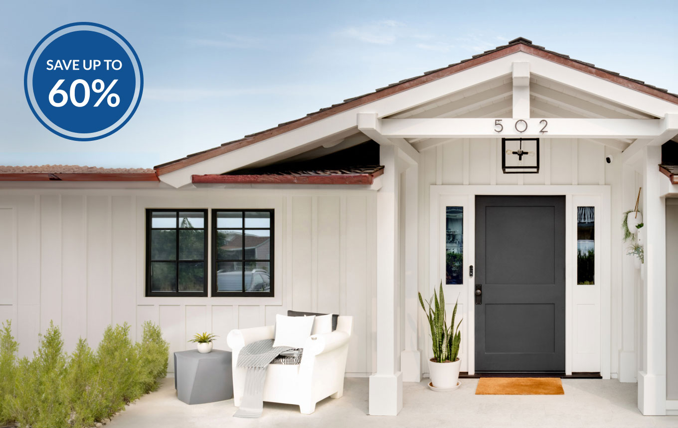 Up to 60% off. Various Arlo security products mounted near the  front door of a home.