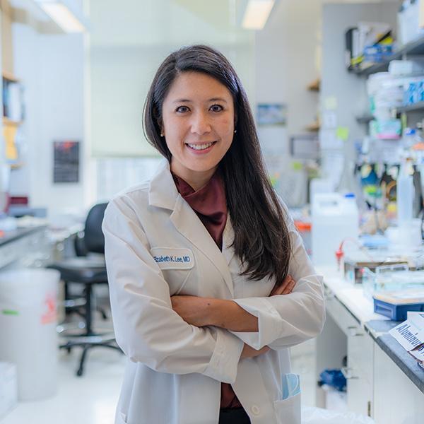 Medical oncologist and investigator Elizabeth Lee, MD, pictured in her lab, began at Dana-Farber as an early-career investigator