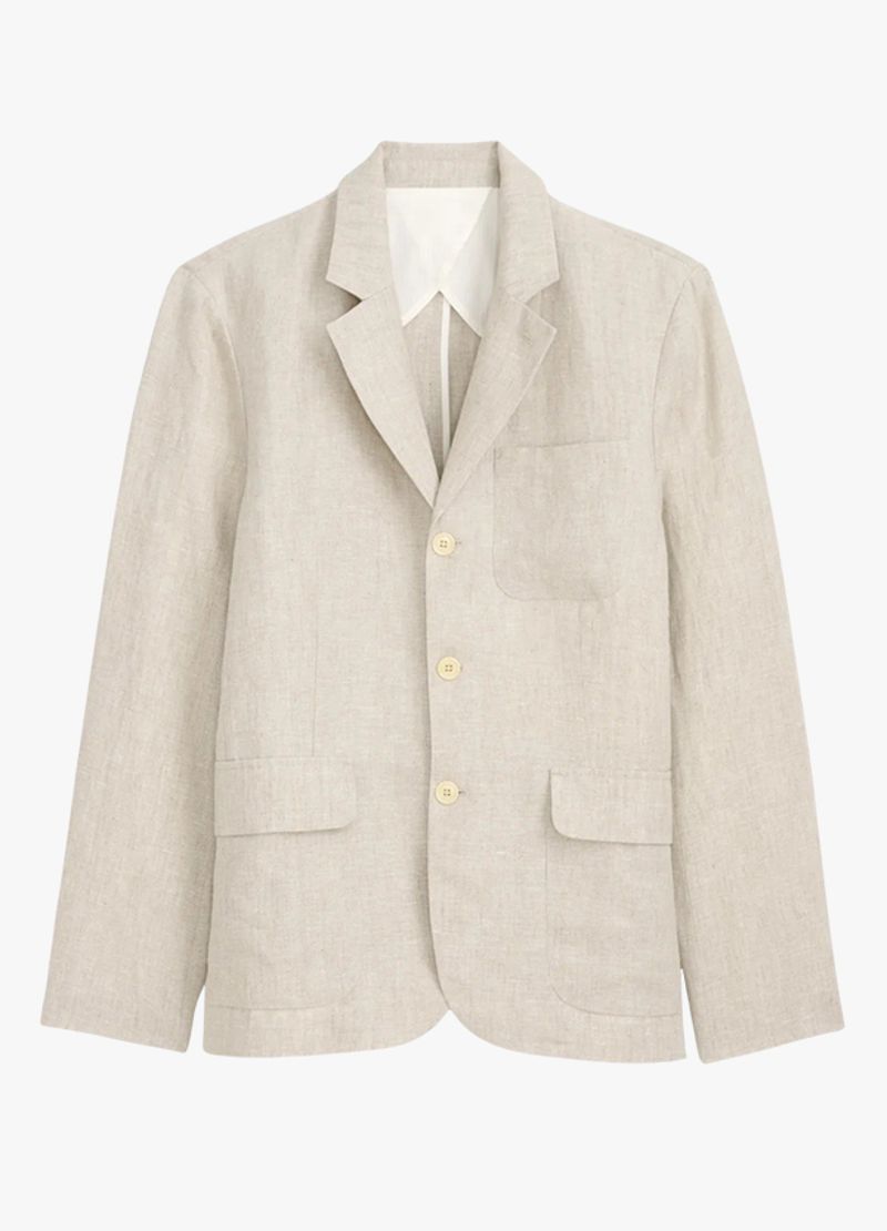 Image may contain: Blazer, Clothing, Coat, Home Decor, Jacket, Linen, Formal Wear, and Suit