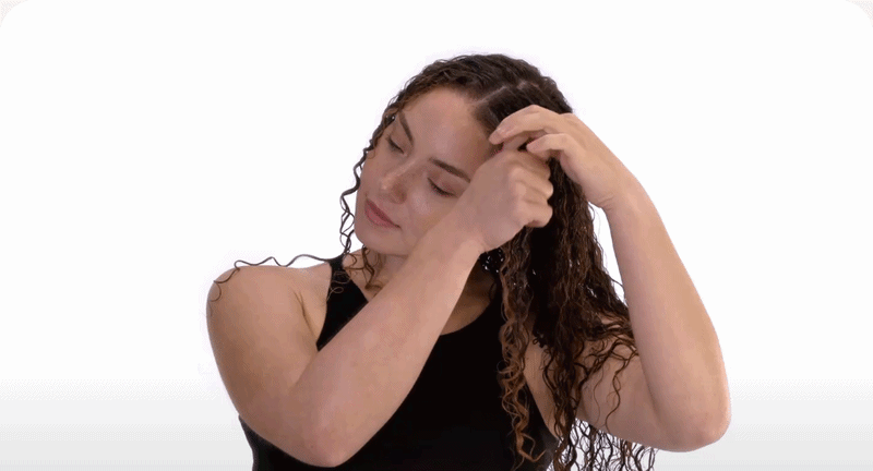 Finger Coiling - Find curls that need more definition. Apply a small amount of product, then wrap each section around your index finger from the root and slide to the ends.  Product Recommendation:   Curl Quencher® Hydrafusion® Intense Curl Cream