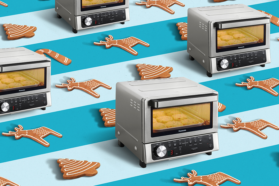 FlashXpress Toaster Oven arranged with christmas cookies on blue background
