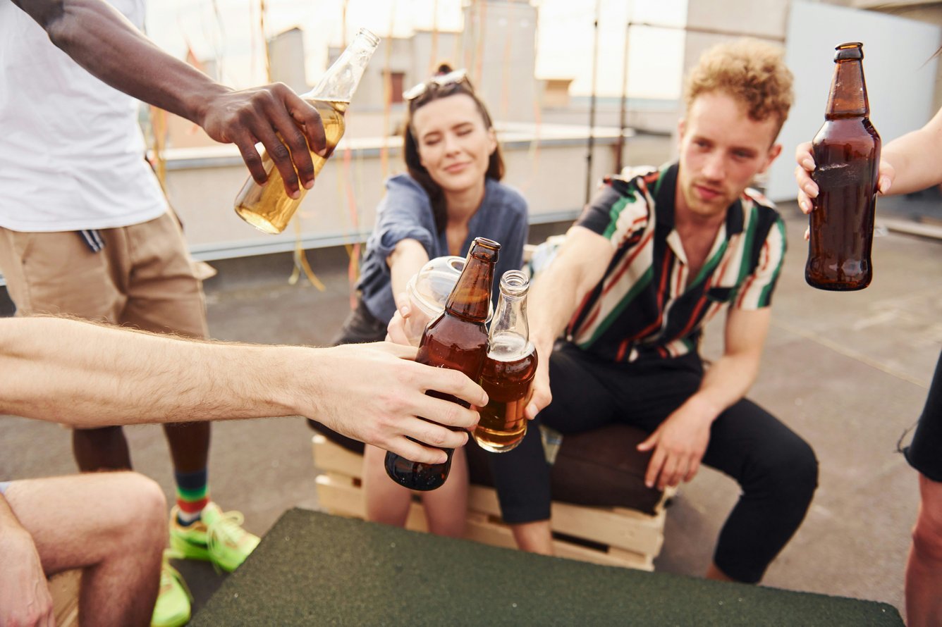 Group of friends drinking on a rooftop