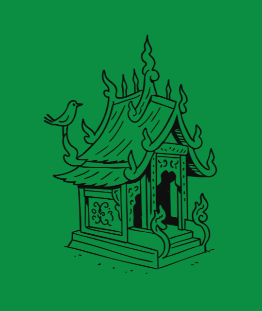 Small decorative house on a green background