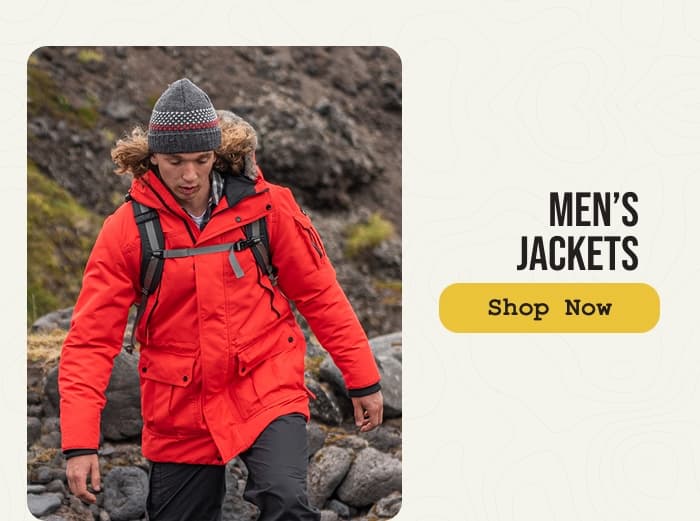 Photo of a man wearing a Craghoppers Bishorn II Insulated Jacket on a black sand beach in Iceland. CTA:Men's Jackets: Shop Now