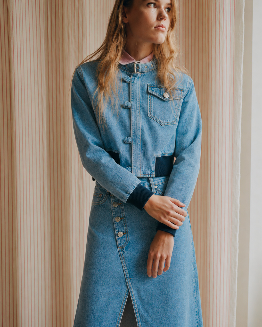 Girl in denim jacket and skirt