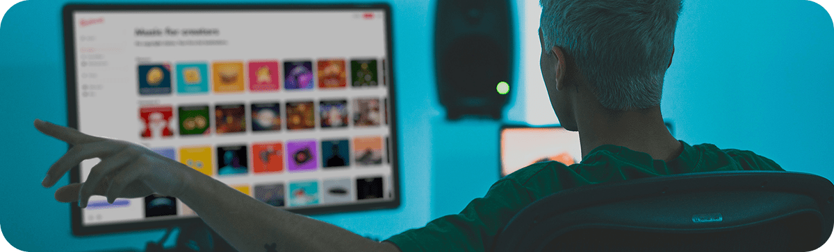 An image of a creator using the Uppbeat Help Center. 