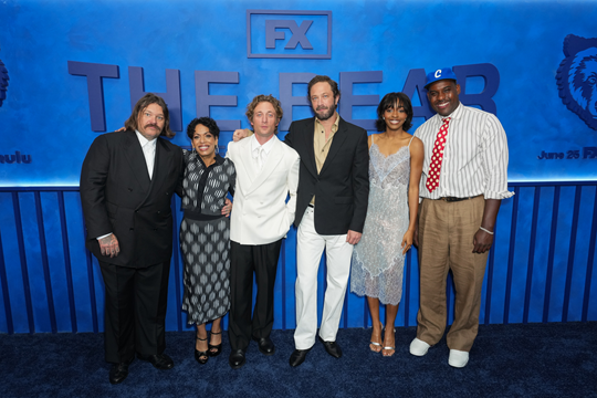 The cast of The Bear posing for a photo.