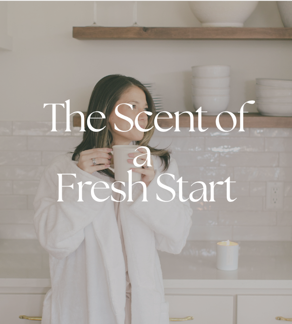 image of woman with burning candle holding a cup of coffee