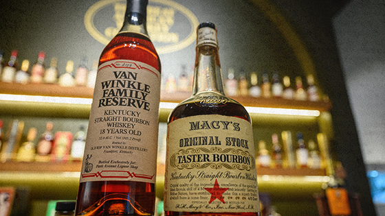 Two bottles of bourbon.