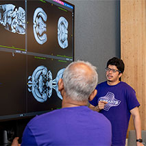 Rohit Jena shows off scans of the human body.