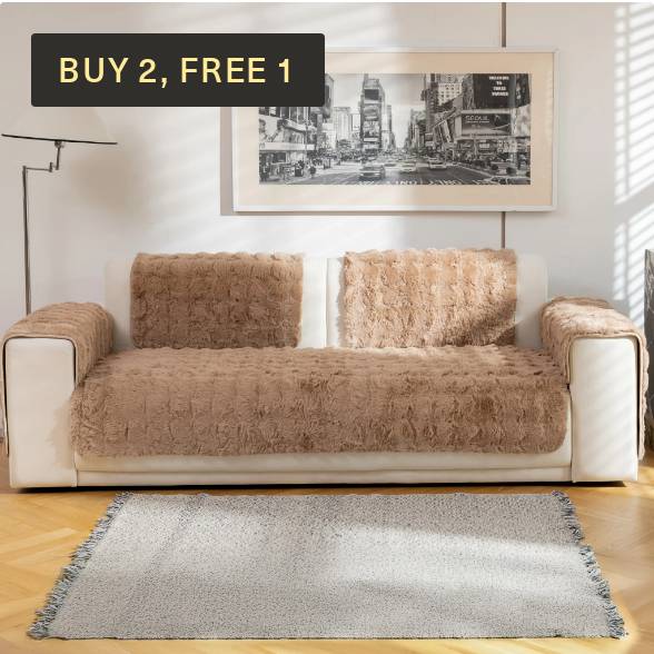 Magic Sofa Mat - Snow in light brown on a sofa with Buy 2, Free 1 offer.