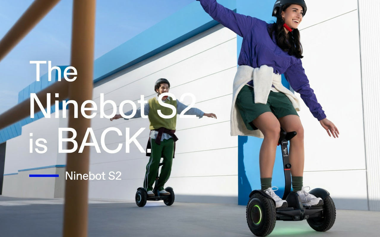 Two people ride Ninebot S2 self-balancing scooters, with text overlay "The Ninebot S2 is BACK."