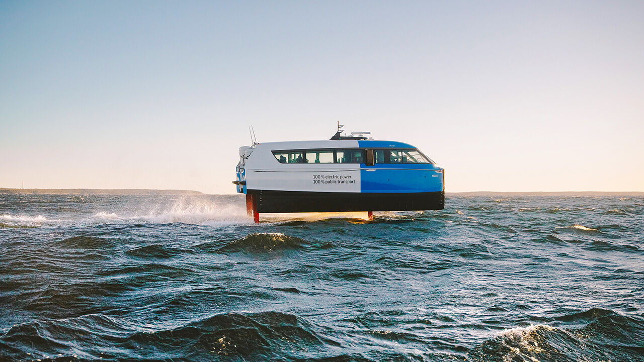 Candela P-12 passenger ferry is shown travelling on the water.