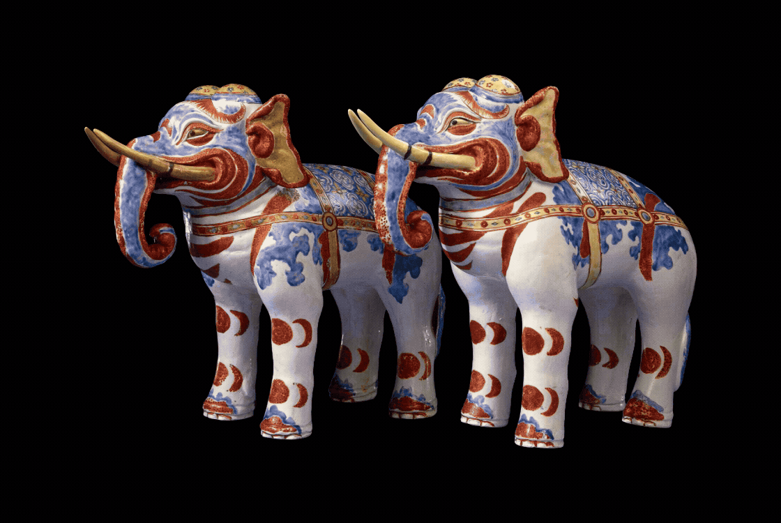 Pair of porcelain Kakiemon elephants, woodcut of a rhinoceros, three tigers crossing a river.