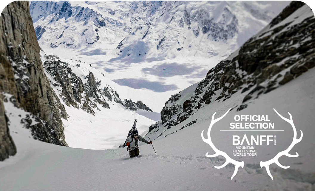 Skier touring up a steep colouir in BC